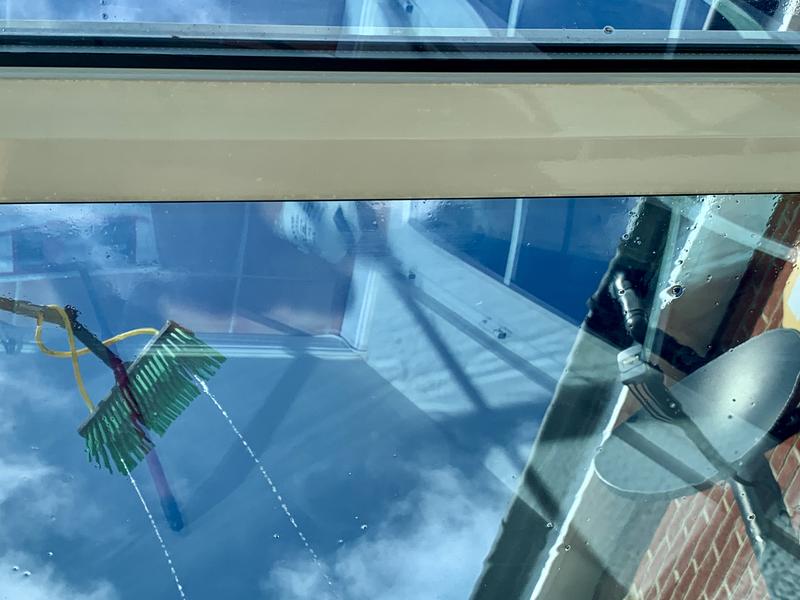 roof of the conservatory being cleaned by reach and wash in Harrow