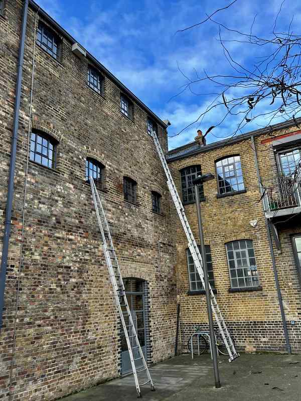 Commercial window cleaning by hand in Islington