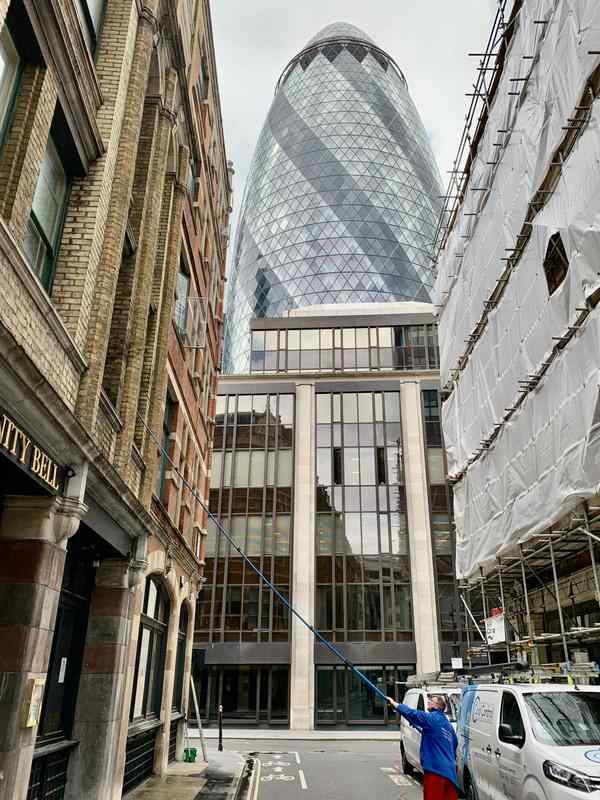 Cleaning windows of a flat in City of London